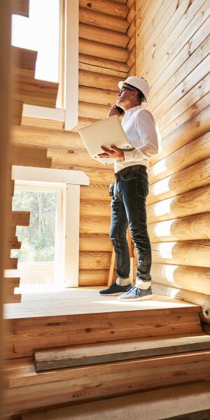 construction person working on phone